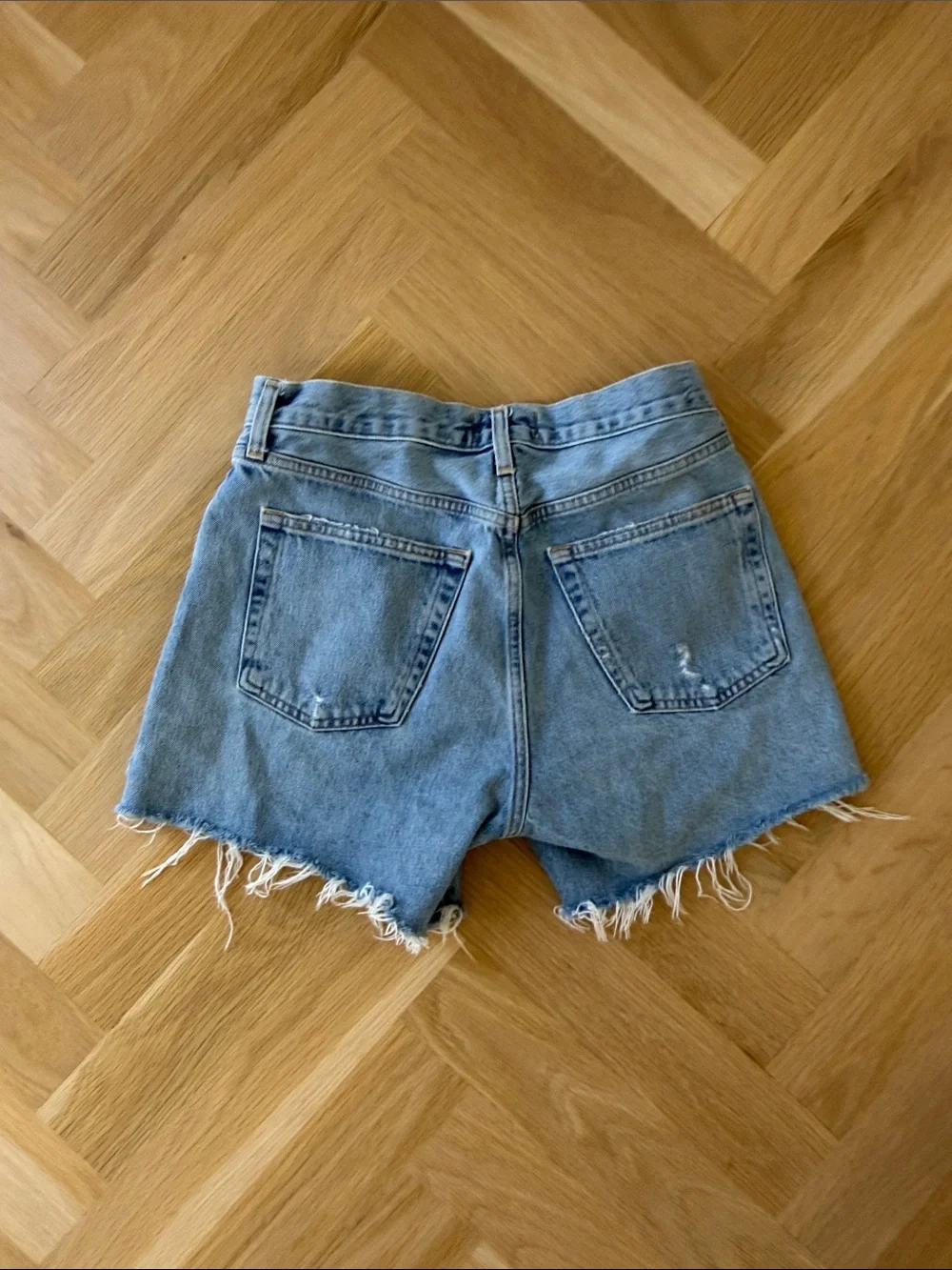 Agolde Light Blue Parker Long Frayed Hem Denim Cutoff Shorts
